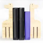 2 boekensteunen in travertijnmarmer in de vorm van een giraf Made in Italy - Morra Viadurini