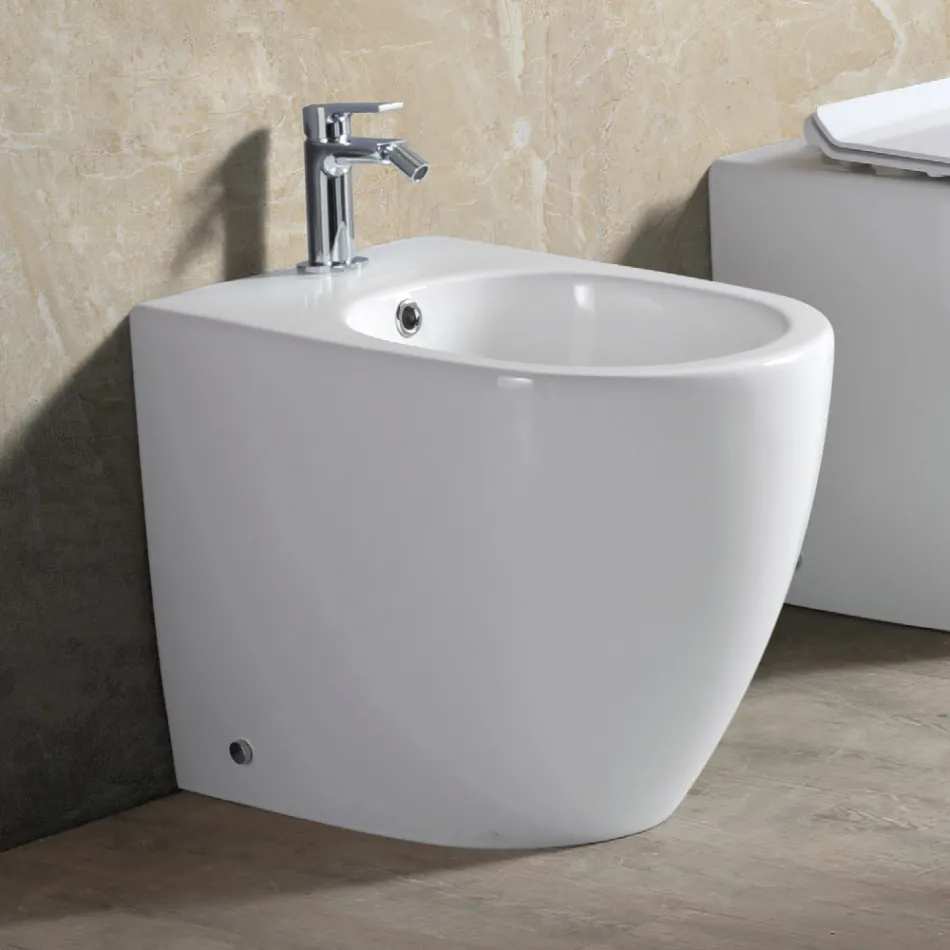 Aster vrijstaande bidet met één spoelgat, uitgevoerd in duurzaam wit keramiek met een modern design. Viadurini