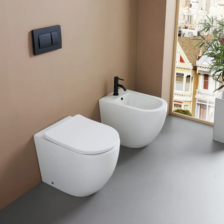 Vrijstaande bidet met één spoelgat, vervaardigd uit duurzaam wit keramiek met een modern design - Olmo Viadurini