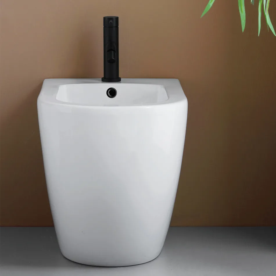 Vrijstaande bidet met één spoelgat, vervaardigd uit duurzaam wit keramiek met een modern design - Olmo Viadurini