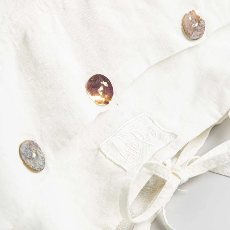 Rechthoekig bedkussensloop van wit of zwart linnen met knopen en veters - Agora Viadurini