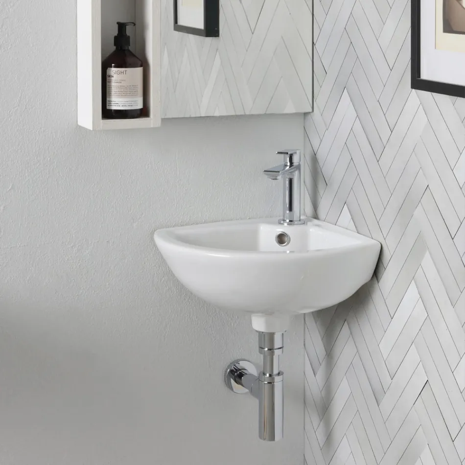 Hoekwastafel van wit keramiek met een modern en elegant design - Silica Viadurini