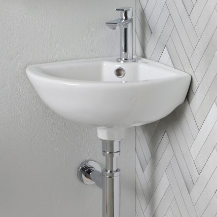 Hoekwastafel van wit keramiek met een modern en elegant design - Silica Viadurini