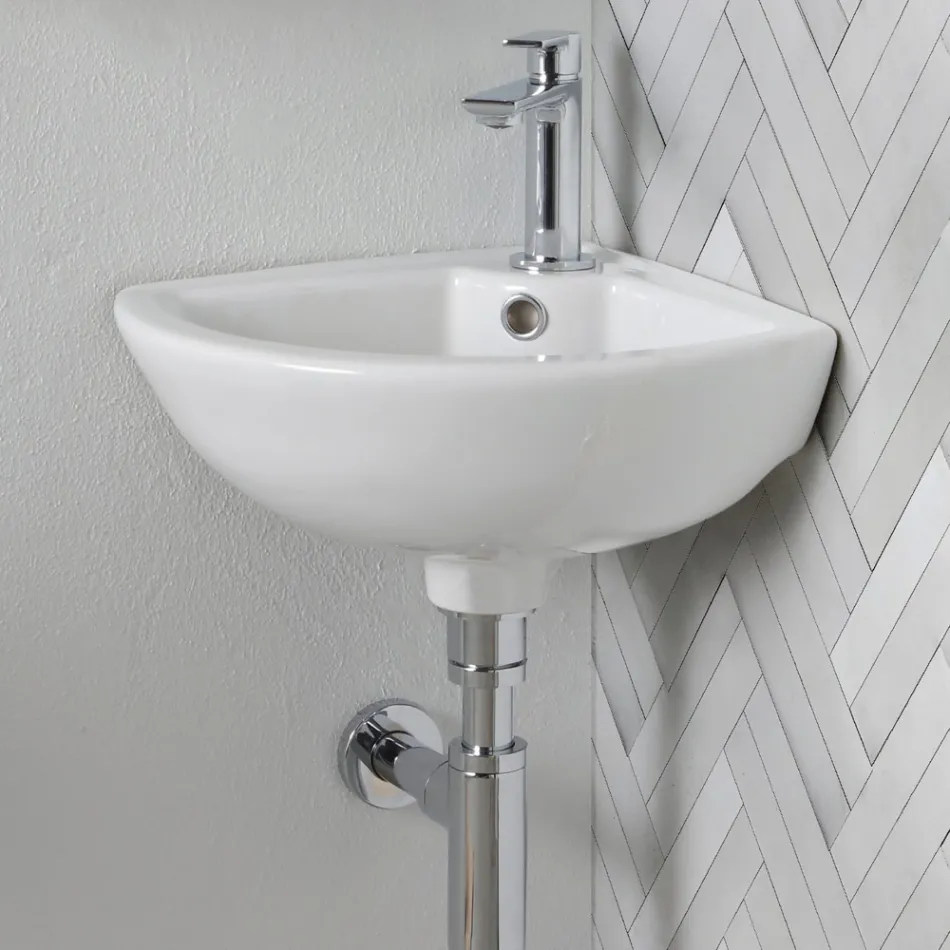 Hoekwastafel van wit keramiek met een modern en elegant design - Silica Viadurini