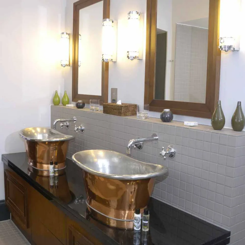 Wastafel badkamer koper ondersteuning en blik Cala Viadurini