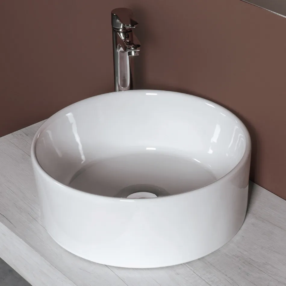 Ronde wastafel voor op het aanrecht, uitgevoerd in wit keramiek en modern design - Papavero Viadurini