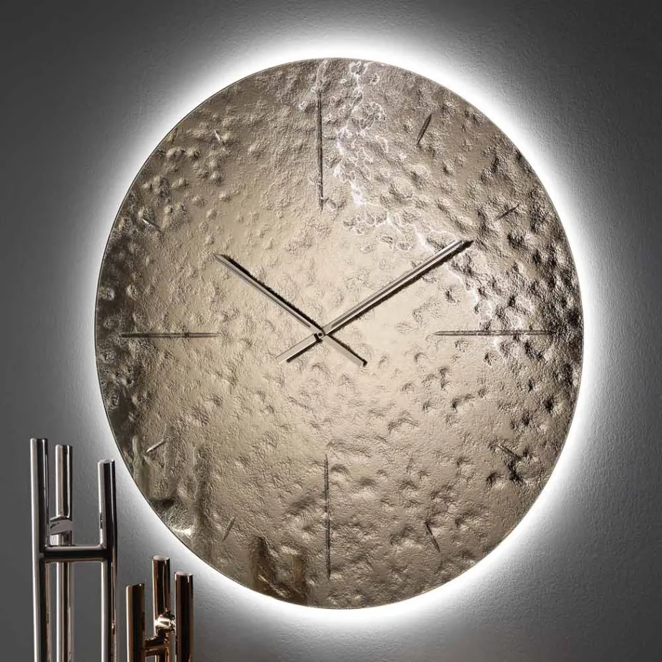 Golvende wandklok van gesmolten glas met messing wijzers - Radia Viadurini