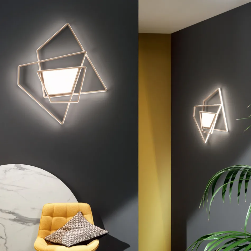 Dimbare LED-wandlamp in goud of zilver metaal - Galactic Viadurini