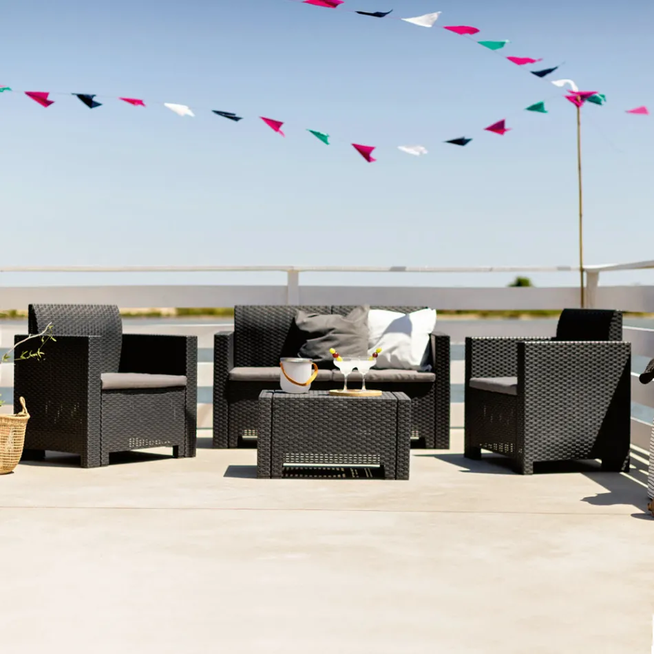 Woonkamer met 1 bank, 2 fauteuils en 1 salontafel met zitkussens - Machine Viadurini