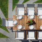 Stapelbare tuinstoel in wit aluminium met armleuningen - Lyonel Viadurini