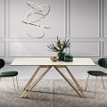Vaste tafel in Calacatta Oro glaskeramiek en metaal Made in Italy - Meluso
