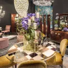 Modeno Ronde tafel met glazen blad en Ozzy houtinleg Viadurini