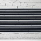 Hydraulische radiator met verticale collectoren en horizontale buizen - Samengesteld Viadurini
