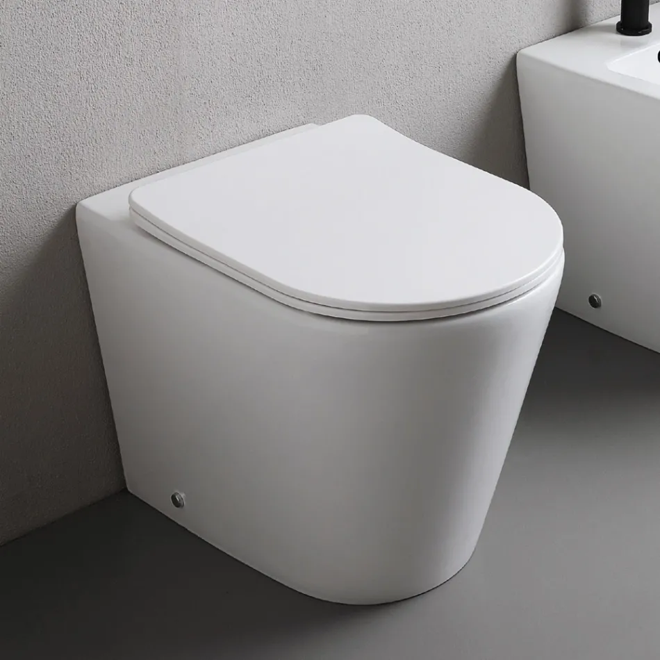 Vrijstaand toilet met slanke softclose-zitting in wit keramiek - Salice Viadurini