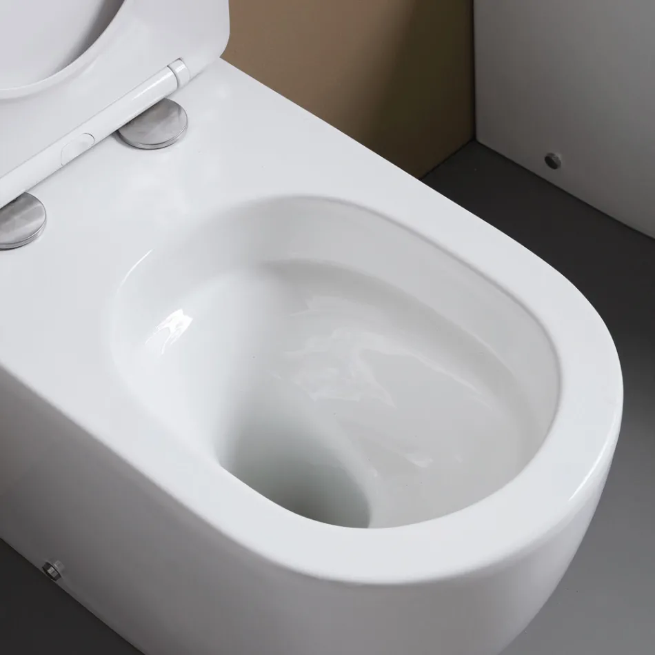 Vrijstaande toiletpot met softclose zitting in wit keramiek - Elm Viadurini