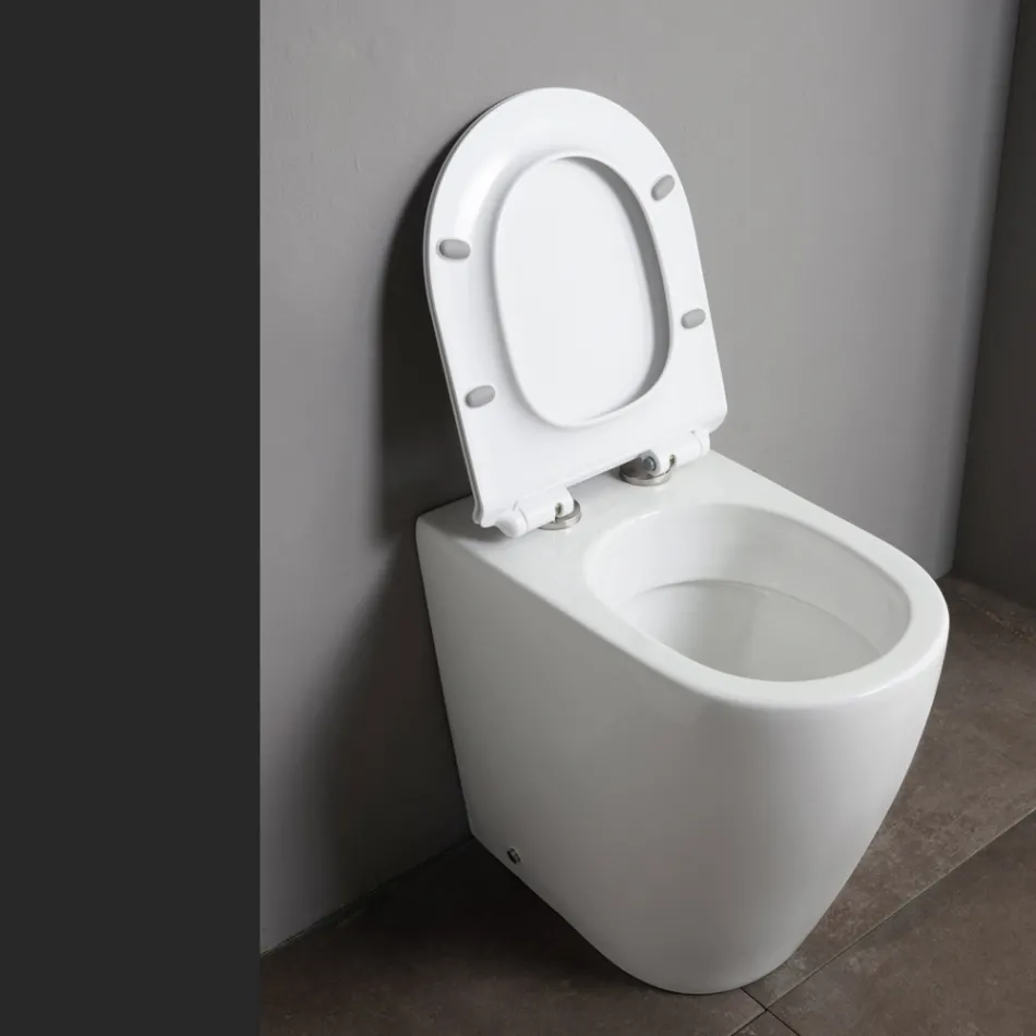 Oleander keramisch toilet met uitschuifbare spoelfunctie en softclose toiletbril. Viadurini