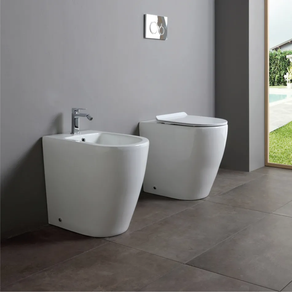 Oleander keramisch toilet met uitschuifbare afvoer en softclose toiletbril. Viadurini